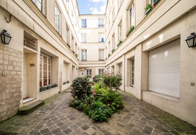 Appartement à Paris - Bon Marché Rousselet